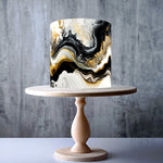 Marble wave pattern in black, white, and gold edible cake topper decoration