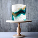 Ocean wave-inspired teal and gold design edible cake topper decoration