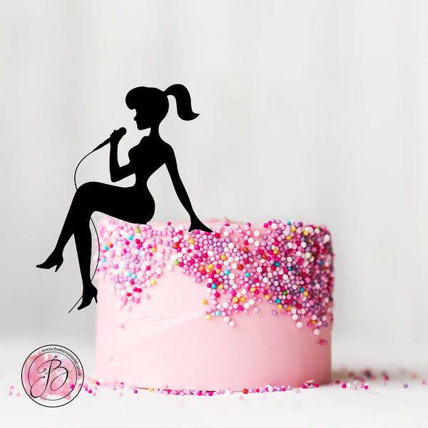 Sitting girl silhouette holding microphone cake topper